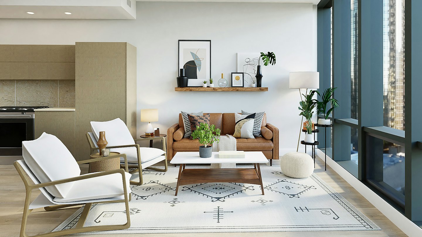 Modern living room with leather sofa and city view.